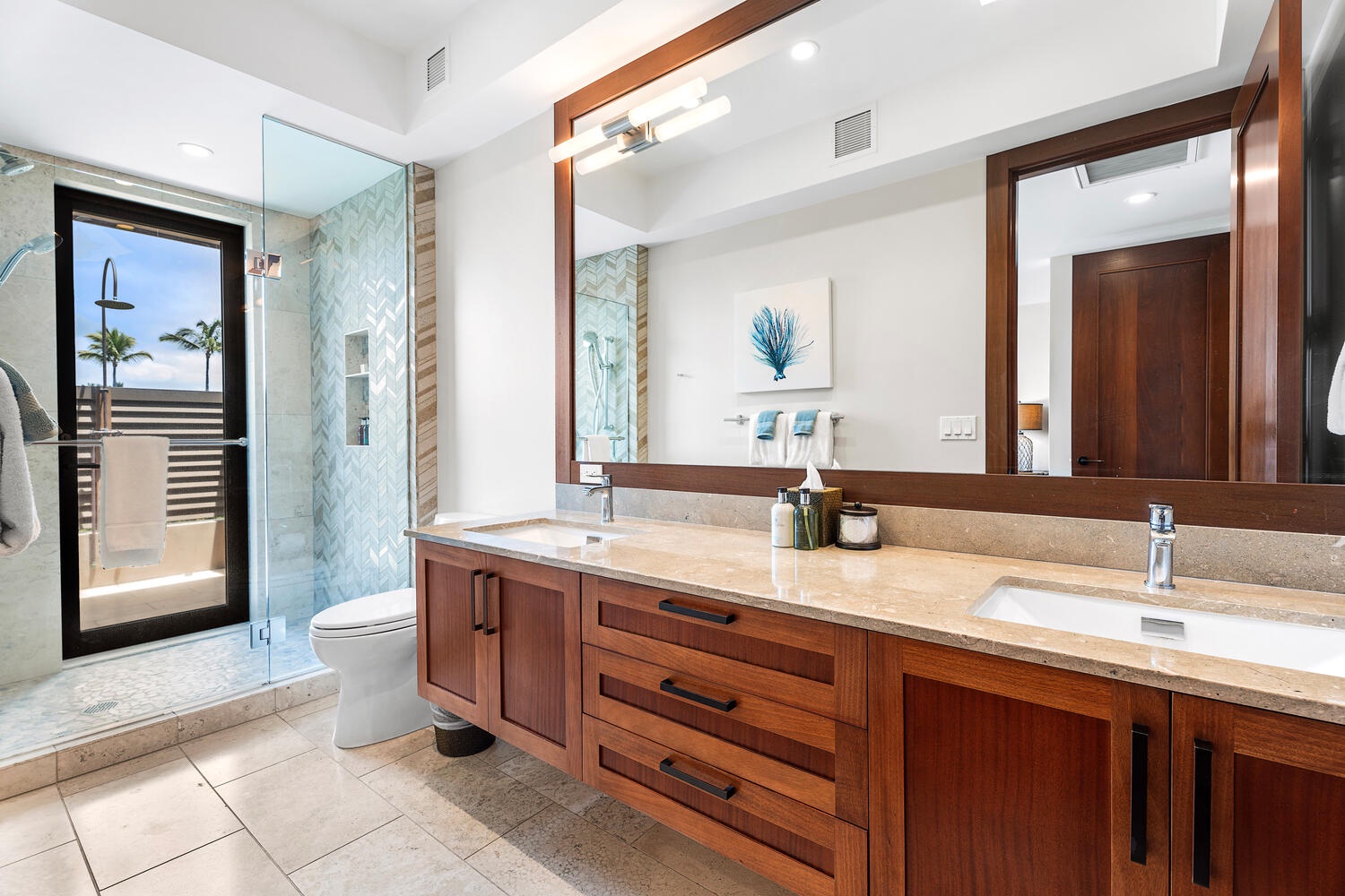 Kamuela Vacation Rentals, Laule'a Ohana Retreat - Ensuite bath with dual vanity, glass shower, and private lanai access at Laule'a #13.