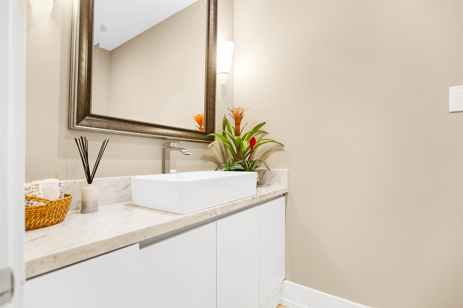 Honolulu Vacation Rentals, Pili Pono - Powder room with sleek finishes and vessel sink.