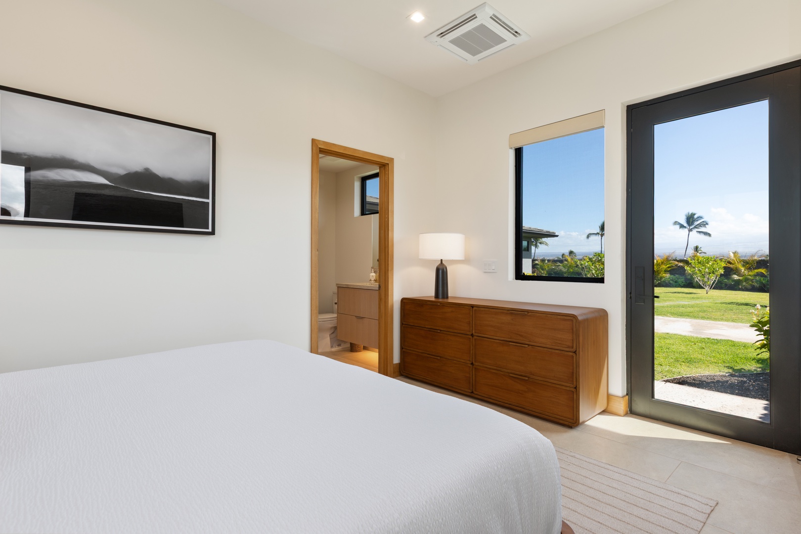 Kamuela Vacation Rentals, 5BD Mauna Lani Lux Ocean Estate (OE12) at One Ocean - (Bedroom #5) Wake up in your serene bedroom with garden views and contemporary furnishings creating the perfect tropical escape.