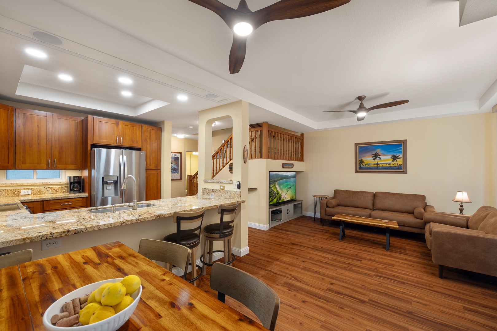 Kapolei Vacation Rentals, Fairways at Ko Olina 24H - Enjoy a meal at the breakfast bar with seating for four, overlooking the open living space.