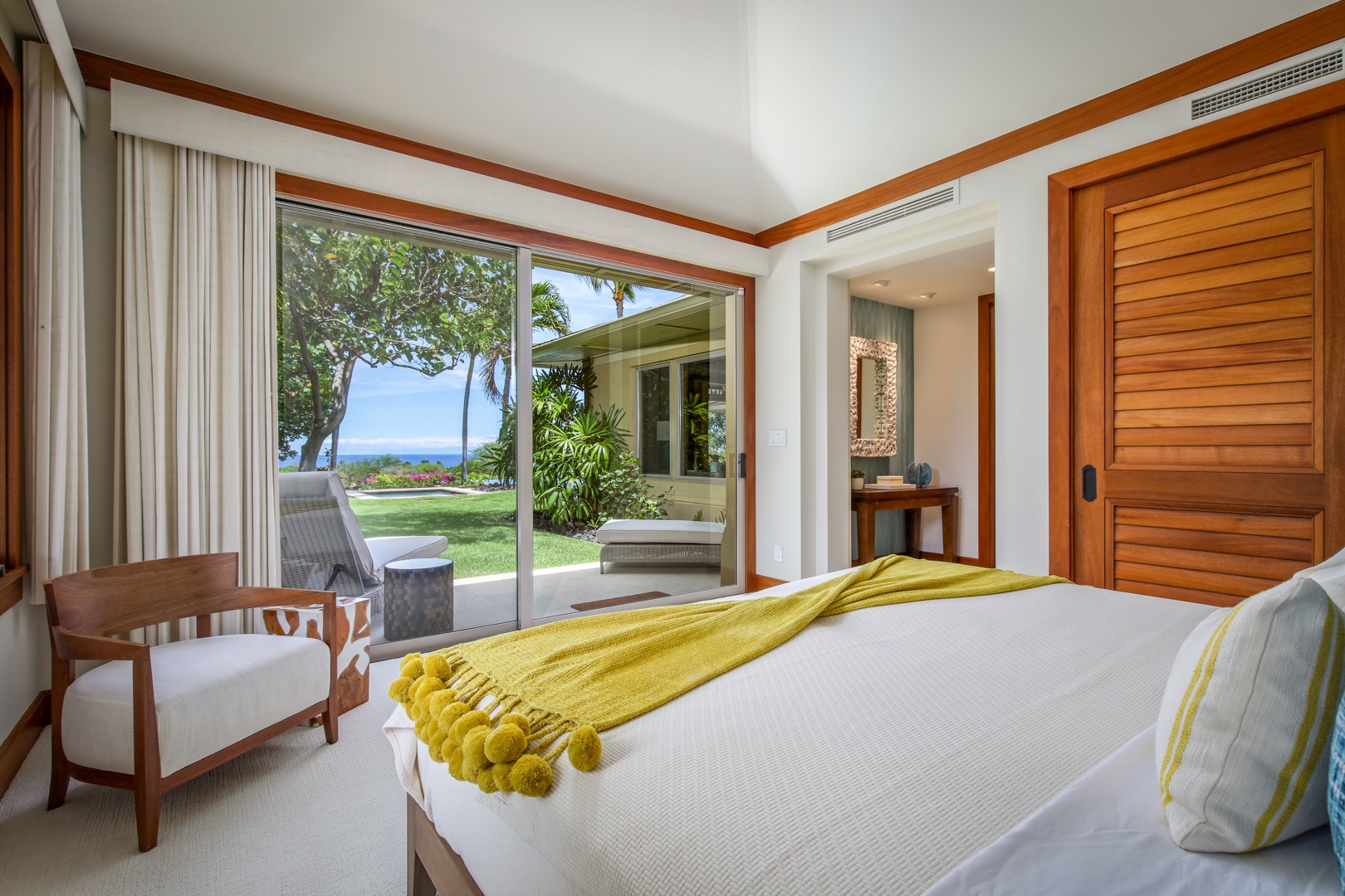 Kailua Kona Vacation Rentals, 4BD Hainoa Estate (122) at Four Seasons Resort at Hualalai - Reverse view of Guest Room 2 showcasing ocean views and private lanai with lounge seating.