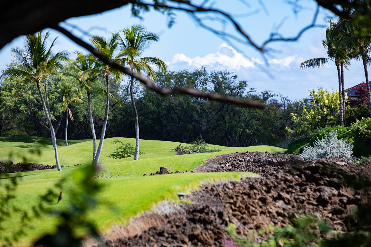 Kamuela Vacation Rentals, Mauna Lani KaMilo #123 - The lush Mauna Lani North Course is just a few steps away from the front door.