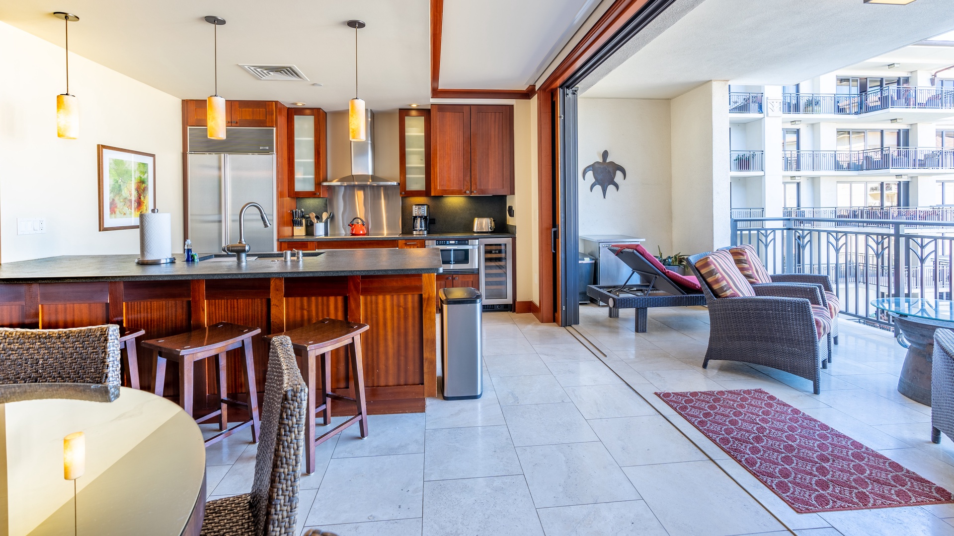 Kapolei Vacation Rentals, Ko Olina Beach Villas O704 - The kitchen is equipped with stainless steel appliances and ocean views.