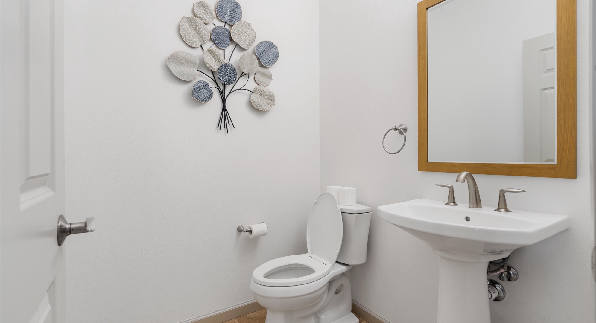 Makaha Valley Vacation Rentals, Makaha Valley Hale Kai** - Half-bath with modern décor and simple, welcoming style.