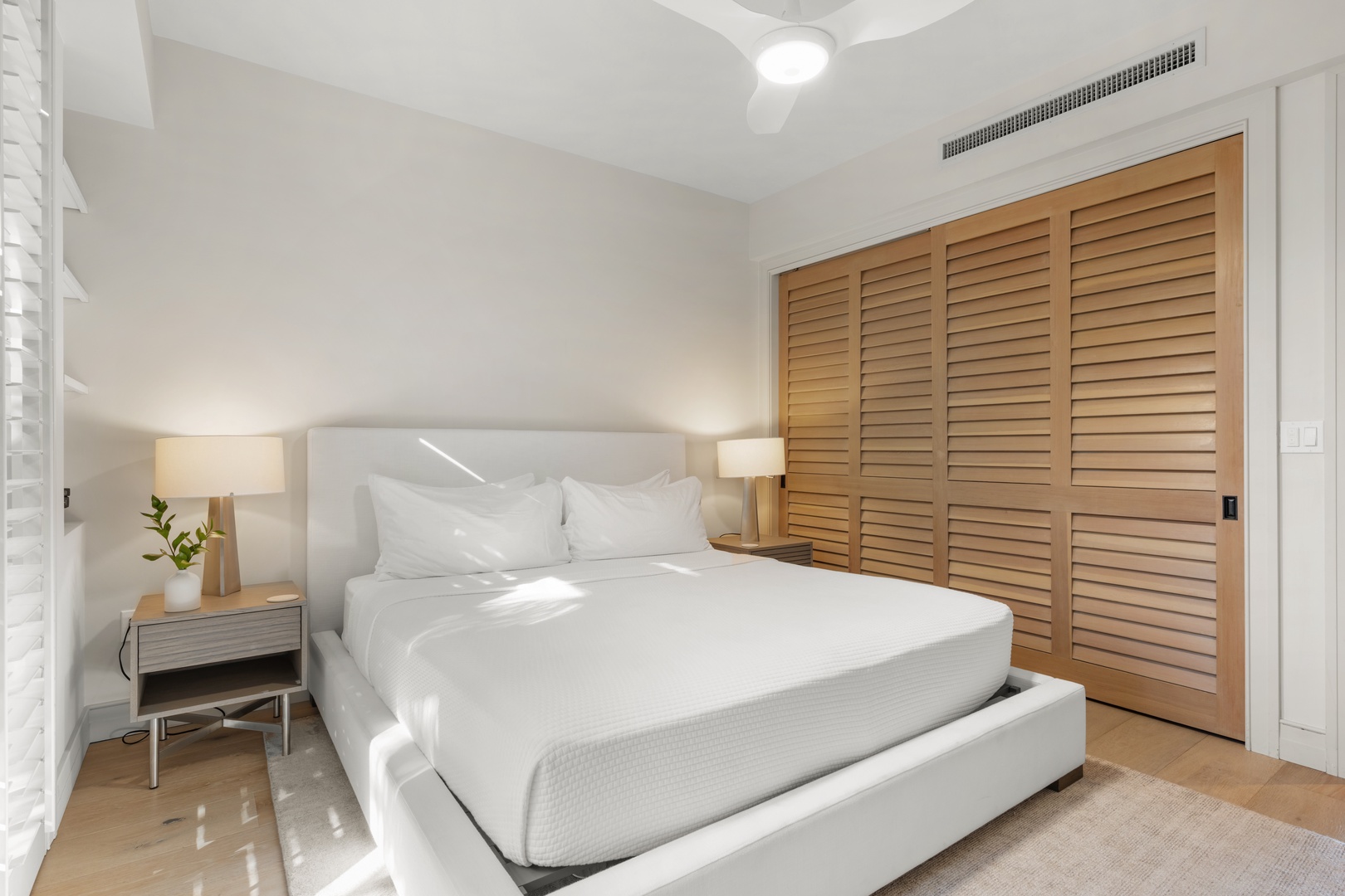 Kailua Kona Vacation Rentals, 3BD Palm Villa (130B) at Hualalai Resort - Slip into crisp white linens in your serene bedroom sanctuary, where warm wood accents and soft lighting create the perfect retreat.