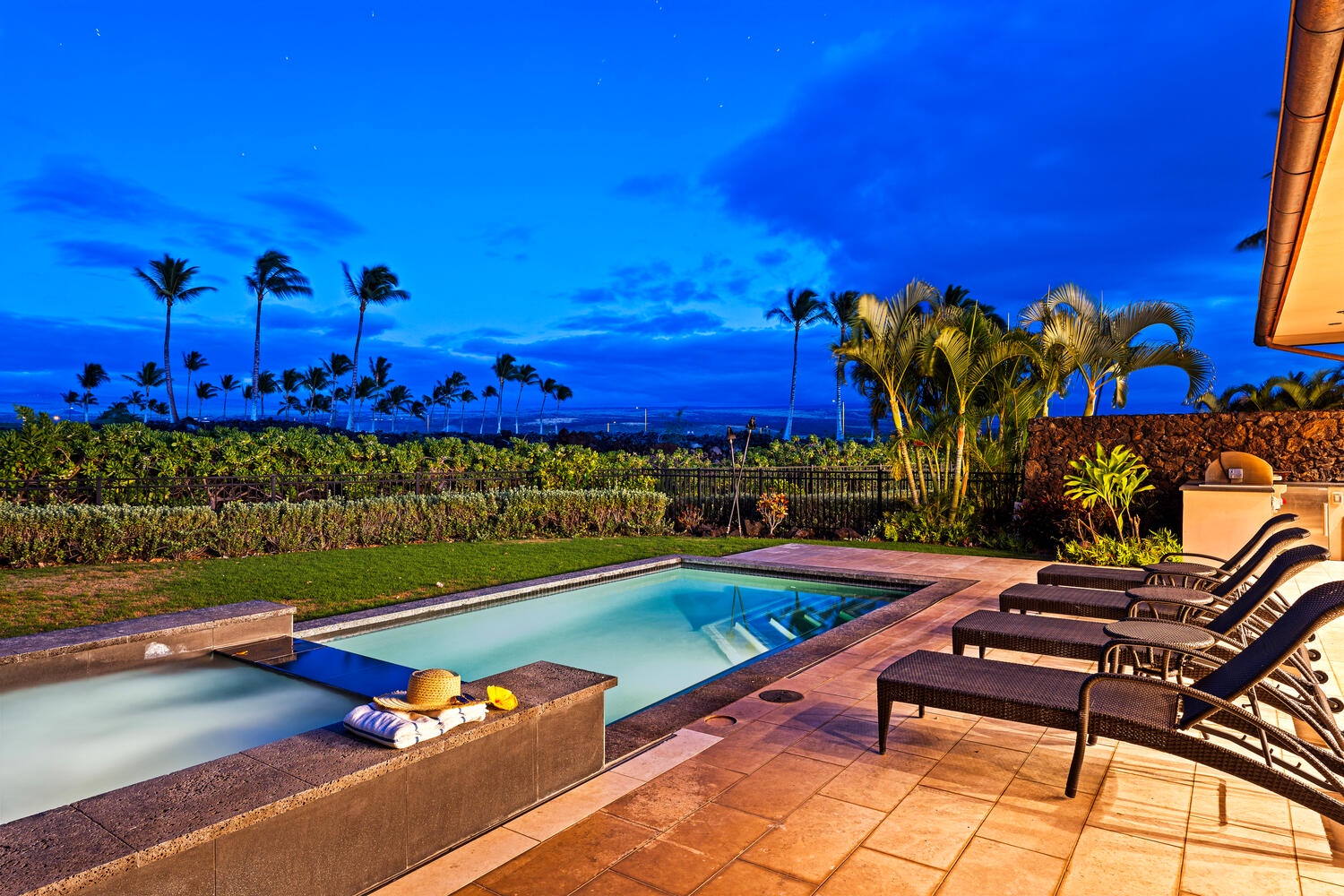Kamuela Vacation Rentals, Laule'a Ohana Retreat - Twilight poolside views with glowing skies and golf course serenity at Laule'a #13.