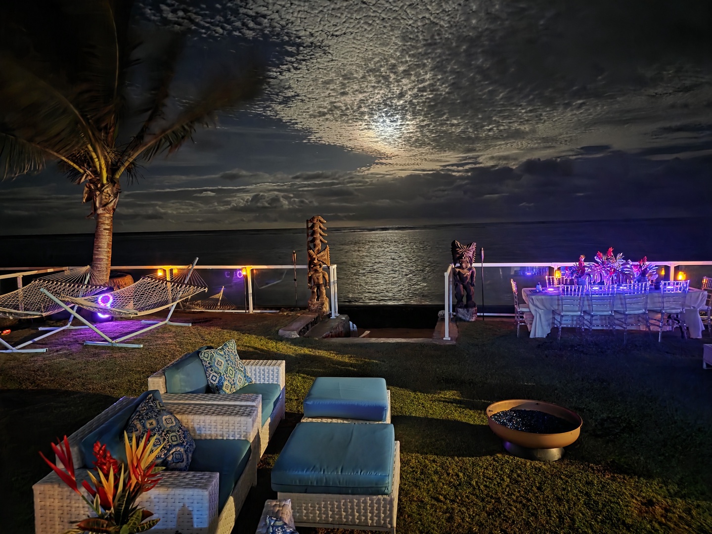 Hauula Vacation Rentals, Private Beach Paradise - Colored lights come up over the lounge as the water goes dark.
