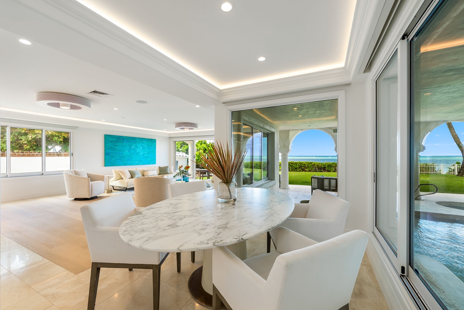 Kailua Vacation Rentals, Lanikai Sunrise Estate - Oceanview dining nook with a round marble table—perfect for morning coffee or intimate evening meals.