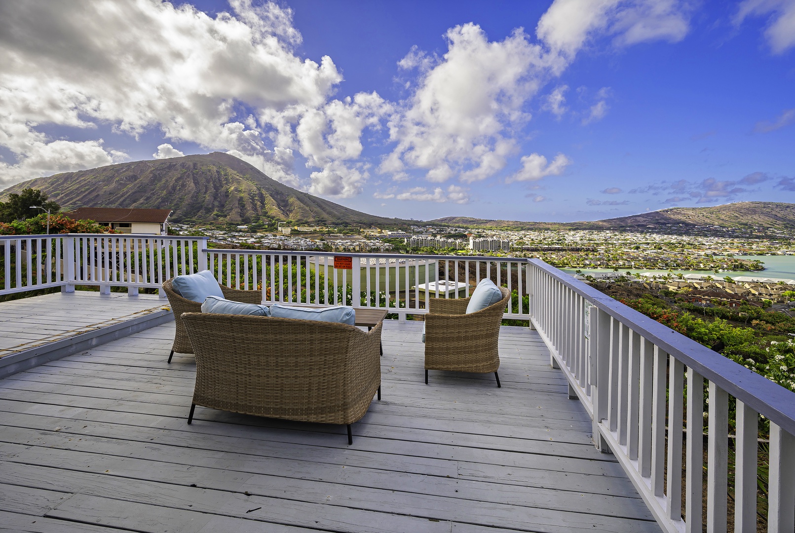Honolulu Vacation Rentals, Hale Malia - Step outside the sliding glass doors to relax on the deck and take in these amazing views