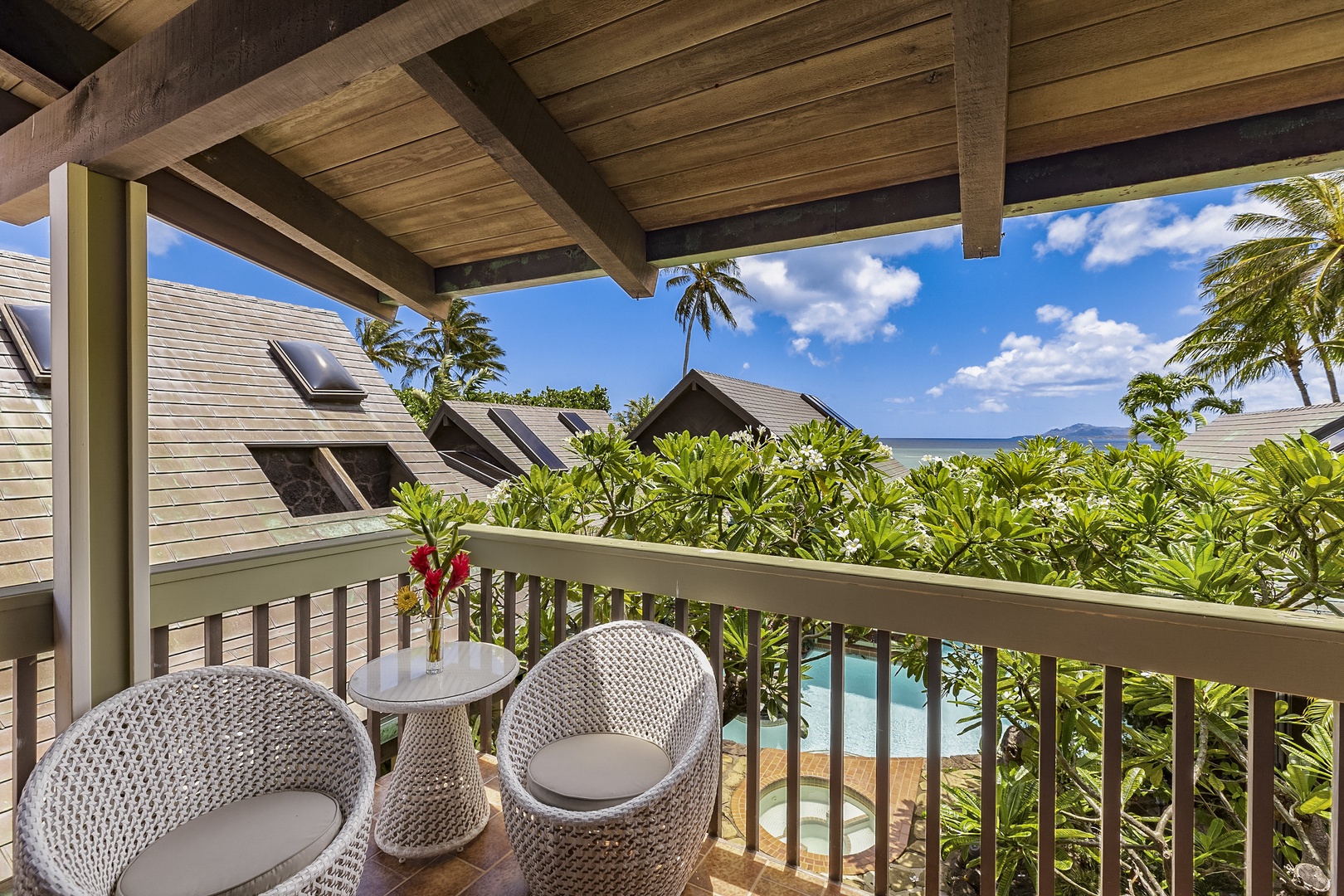 Honolulu Vacation Rentals, Maunalua Sunset - Upstairs Lanai that connects 2 Guest Bedrooms, each with their own lounge seating area.