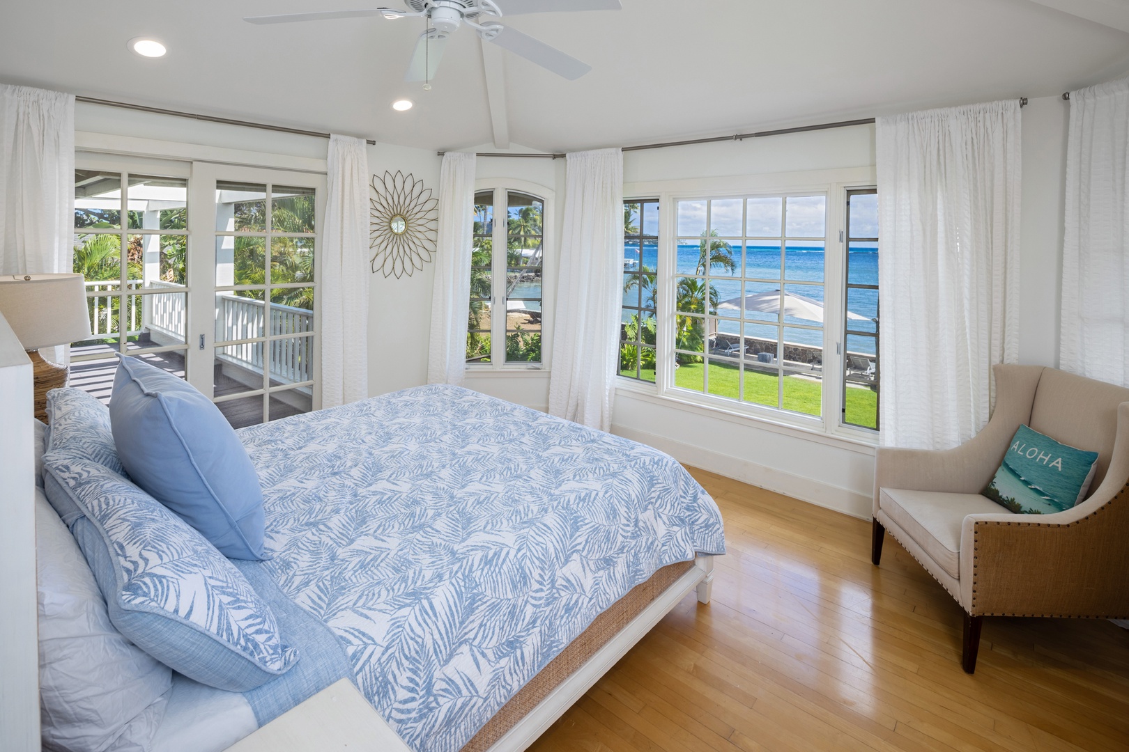 Honolulu Vacation Rentals, Moana Lani - Primary Bedroom 2 with sweeping ocean views, king bed, and bright natural light.