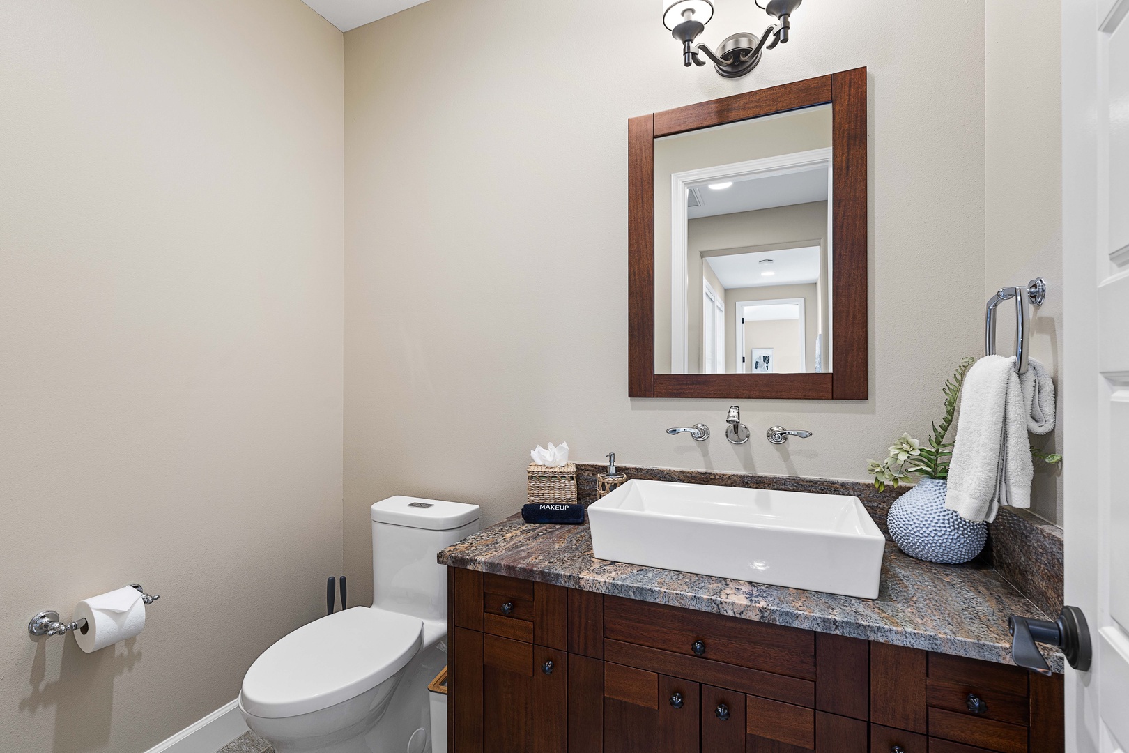 Kailua Kona Vacation Rentals, Holua Kai #27 - A powder room by the living space means guests never wander looking for one.