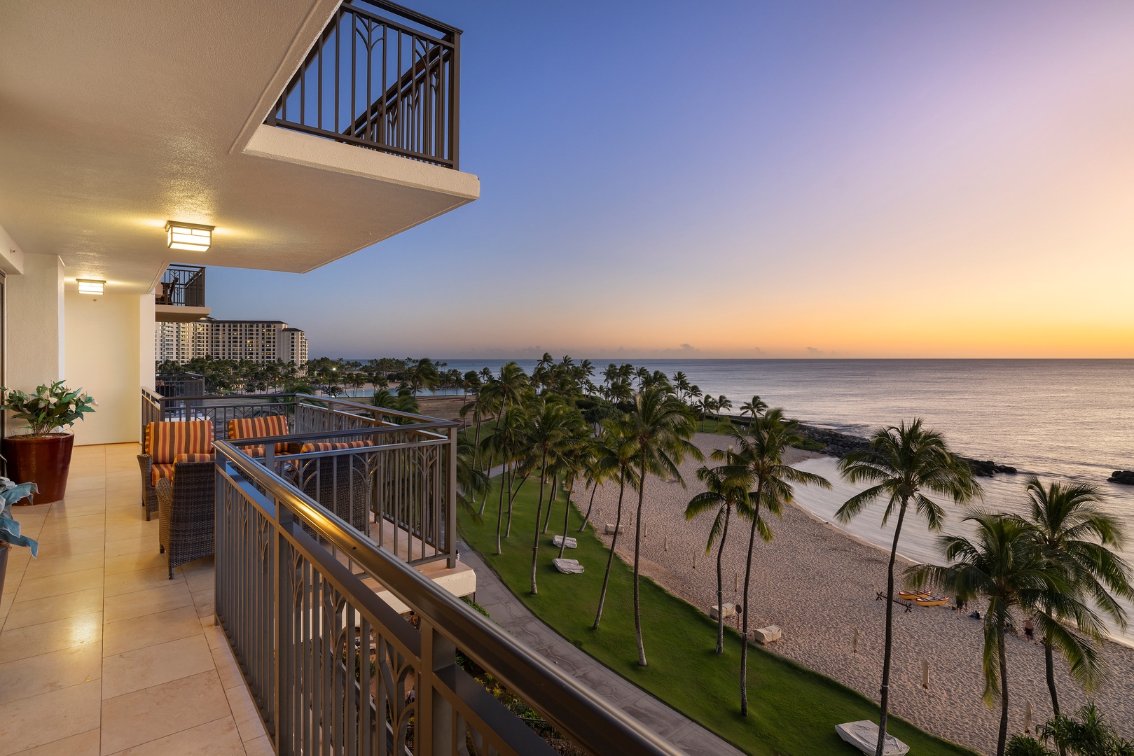 Kapolei Vacation Rentals, Ko Olina Beach Villas B610 - Oceanfront view on the lanai at twilight.