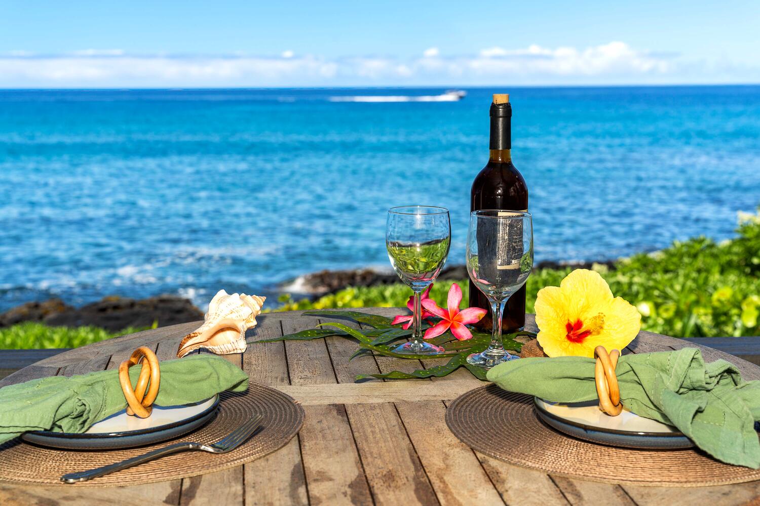 Kailua Kona Vacation Rentals, Hale Kai O'Kona #7 - Oceanfront dining spot with bottle of wine and undisturbed seaside views.