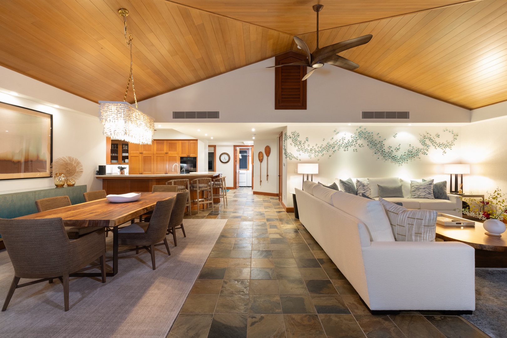 Kailua Kona Vacation Rentals, 3BD Waiulu Villa (111D) at Hualalai Resort - Relax in this stunning open-concept space where warm wood meets modern elegance, perfect for gathering with loved ones under soaring ceilings.