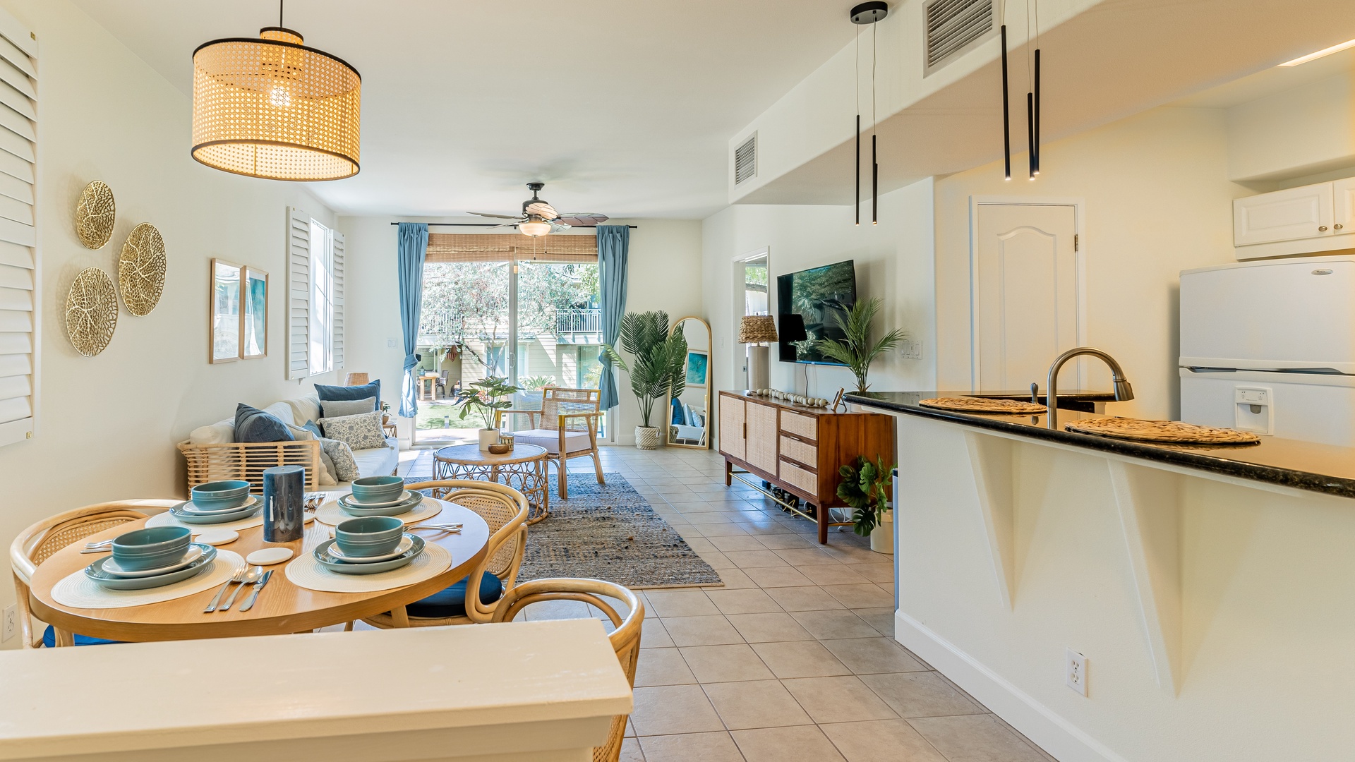 Kapolei Vacation Rentals, Ko Olina Kai 1033A - Seamless living with an open floor plan for cooking, dining and movie night on TV.