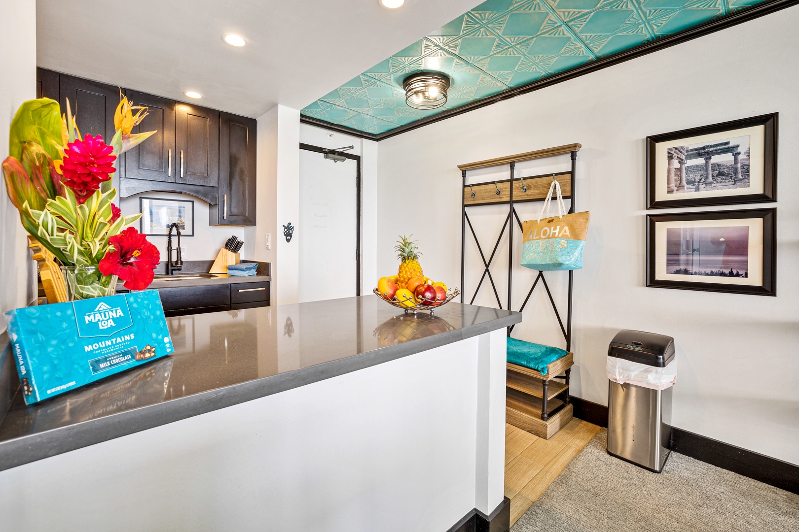 Lahaina Vacation Rentals, Valley Isle 804 - The entryway greets you with a vibrant island feel, featuring modern decor and convenient storage for your beach gear, setting the tone for a relaxing stay.