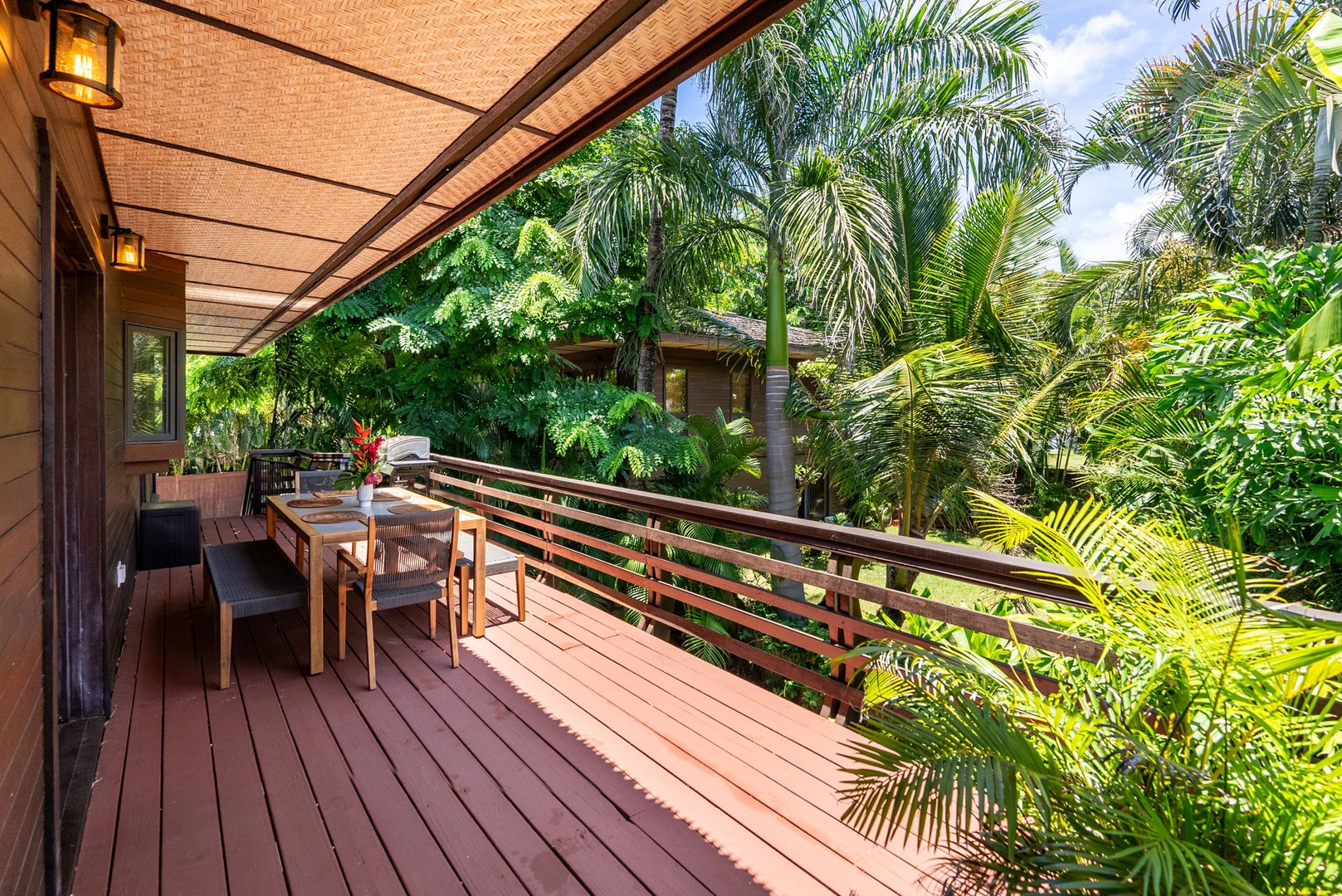 Haleiwa Vacation Rentals, Kealoha Tropical Beach Villa - The deck provide ample space for outdoor dining and relaxation, with a gas grill for barbecues.