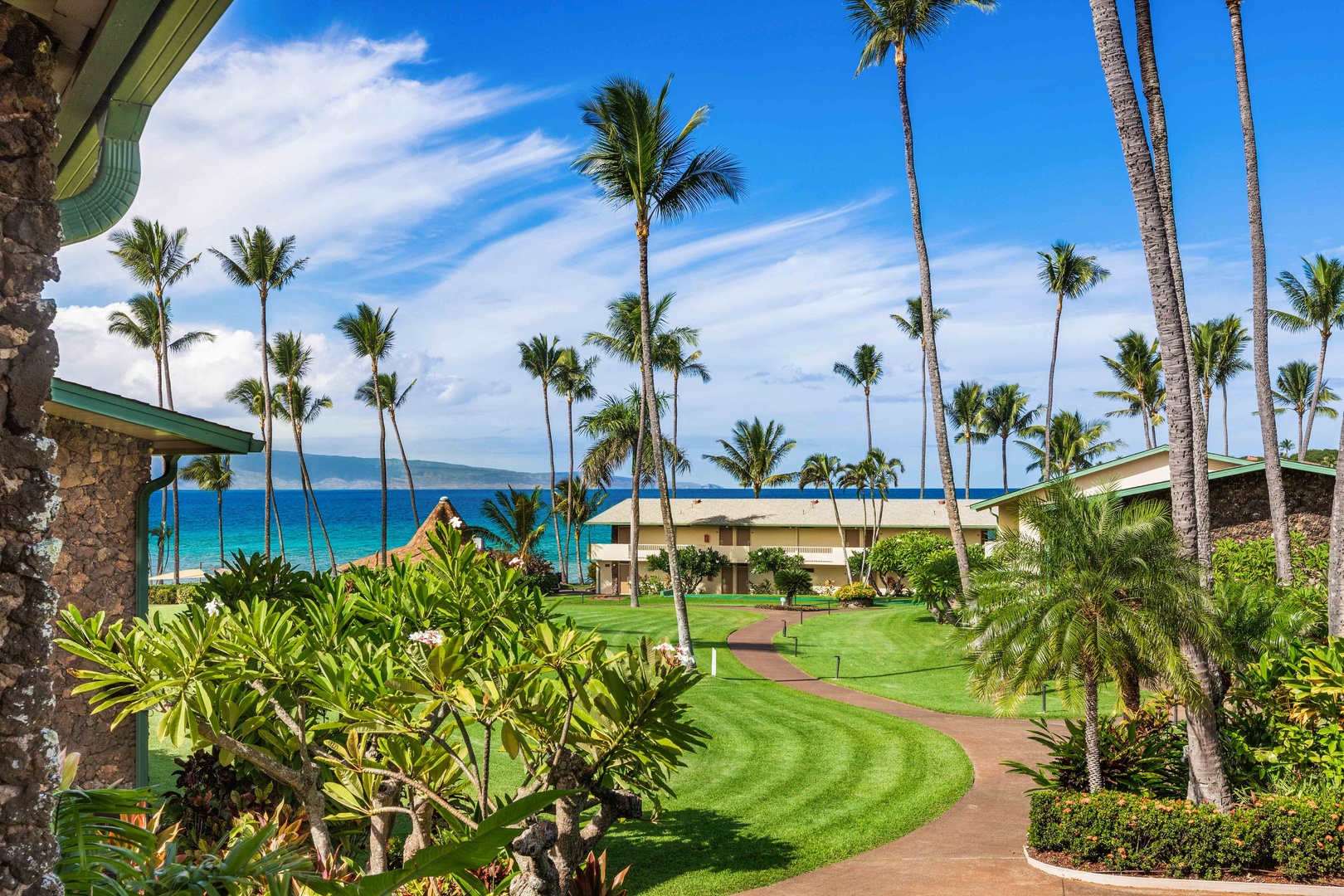 Lahaina Vacation Rentals, Napili Shores F-252 - Beautiful partial ocean view from the lanai of F-252-Plumeria trees bloom in the Spring/Summer