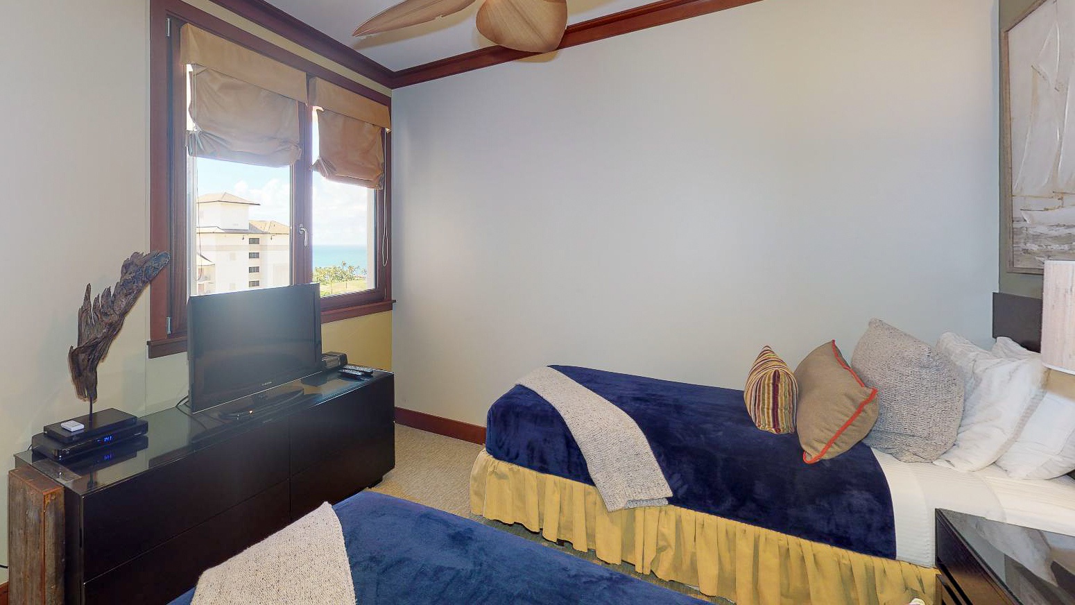 Kapolei Vacation Rentals, Ko Olina Beach Villas O1121 - The third guest bedroom with a TV and a view.