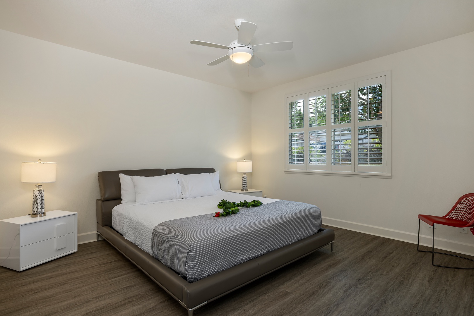 Kapolei Vacation Rentals, Ko Olina Kai 1061F - Drift off in your serene bedroom where soft lighting and modern furnishings create the perfect retreat after exploring.