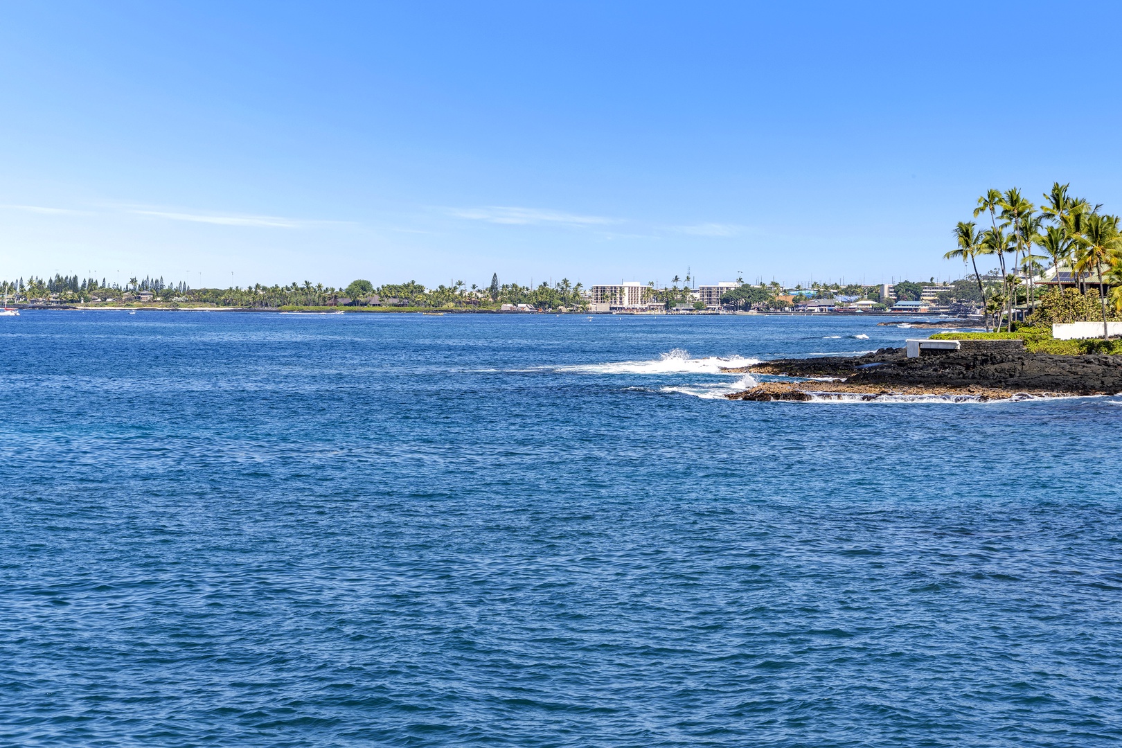 Kailua Kona Vacation Rentals, Sea Village 1105 - Ocean waves crashing ashore at the complex