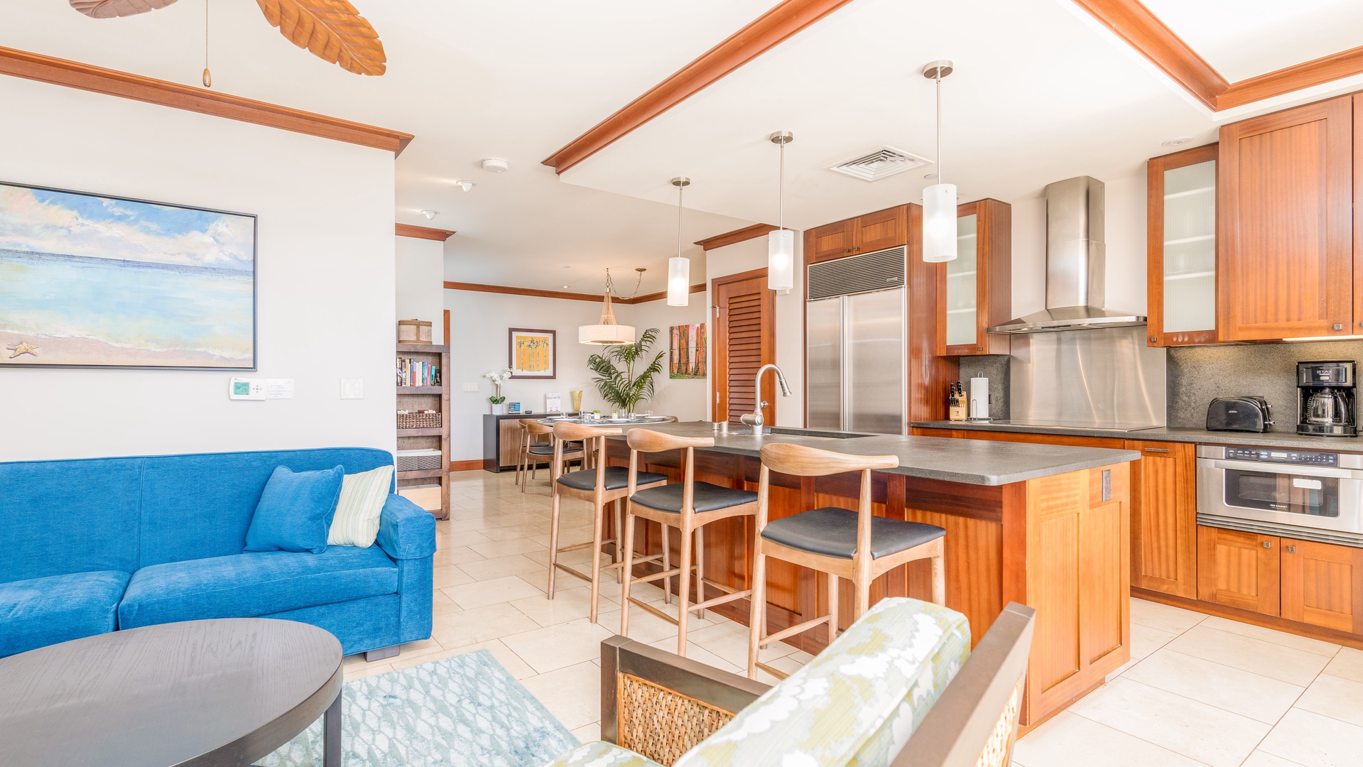 Kapolei Vacation Rentals, Ko Olina Beach Villas O305 - The open floor plan for the kitchen, living and dining areas.