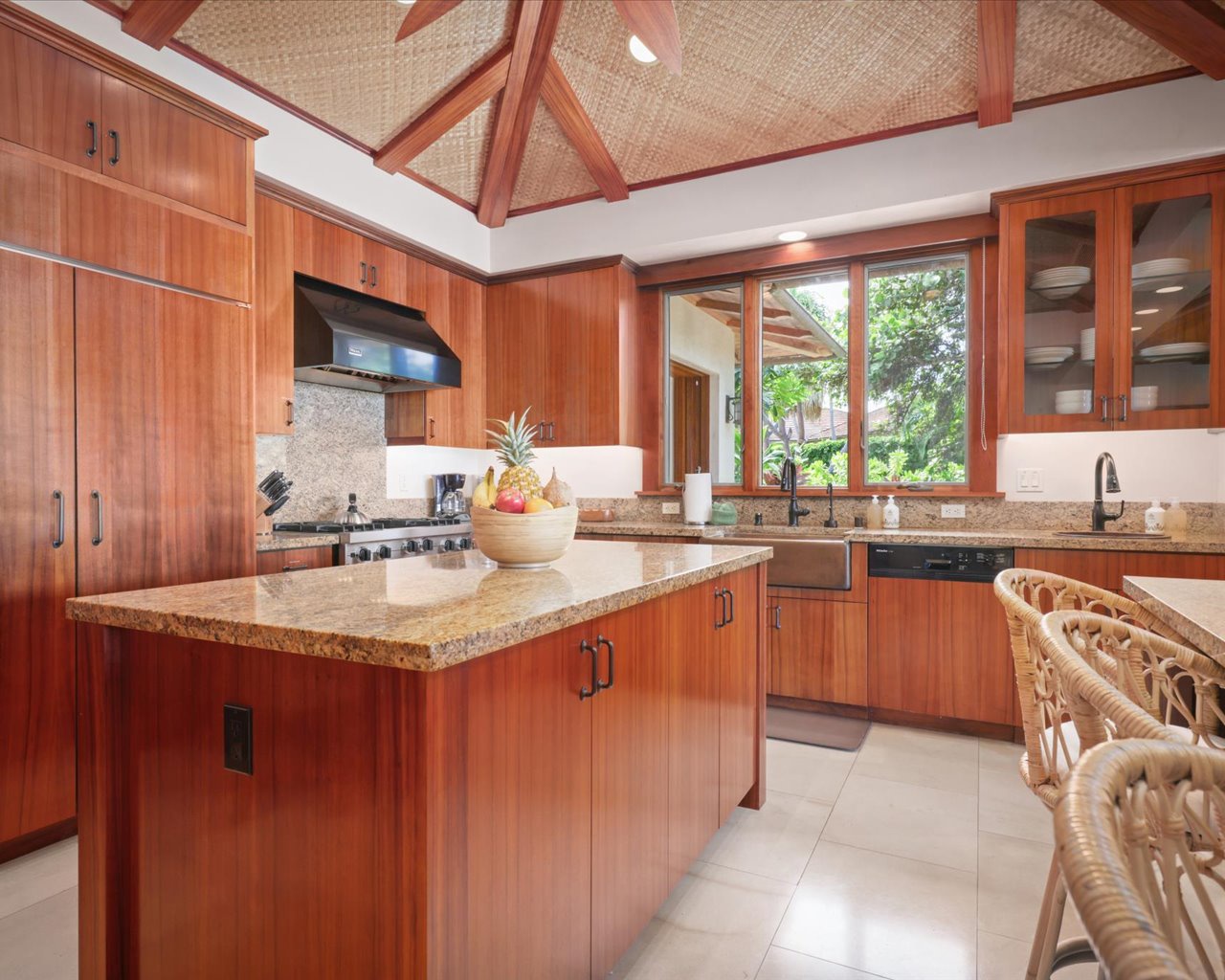 Kailua Kona Vacation Rentals, 3BD Pakui Street Estate (131) at Hualalai Resort - The kitchen comprises of ample counter prep & cabinet space with a circular & open flow