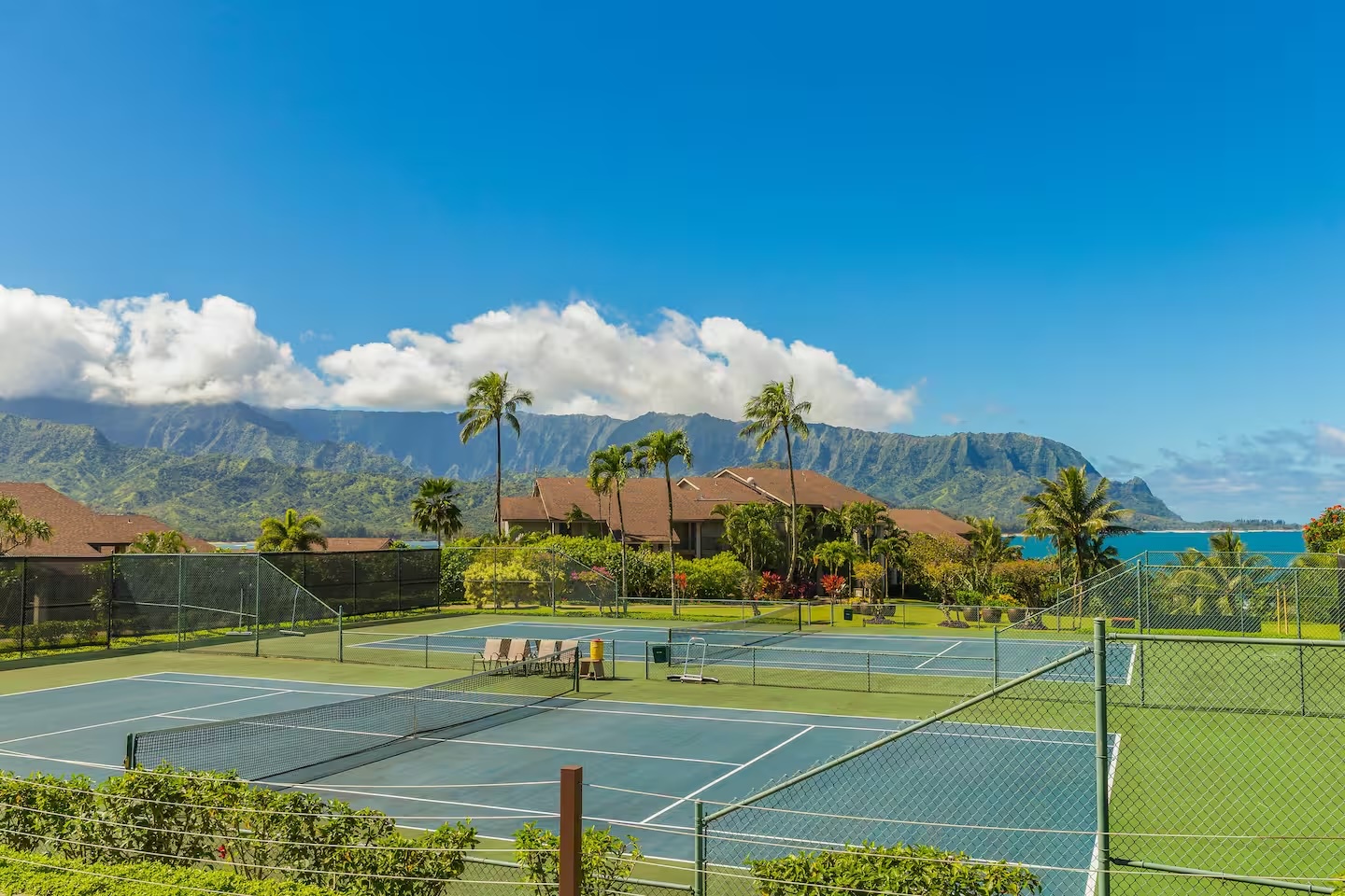 Princeville Vacation Rentals, Hanalei Bay Resort 4301/2/3 - Play a match on our scenic tennis courts with breathtaking mountain views.