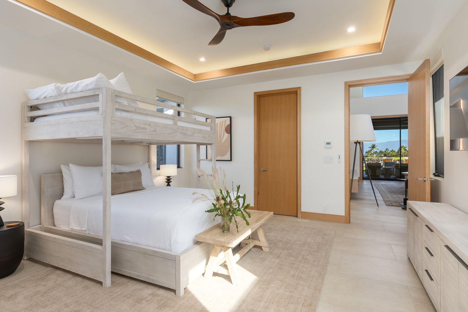 Kamuela Vacation Rentals, 5BD Mauna Lani Lux Ocean Estate (OE12) at One Ocean - (Bedroom #3) Sleep peacefully in your modern bunk bed bedroom, featuring elegant ceiling fan and calming neutral tones for ultimate relaxation.