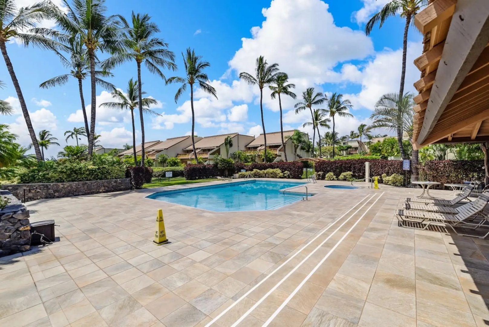 Kihei Vacation Rentals, Maui Kamaole E103 - Another view of the pool, palm lined for an afternoon of fun.