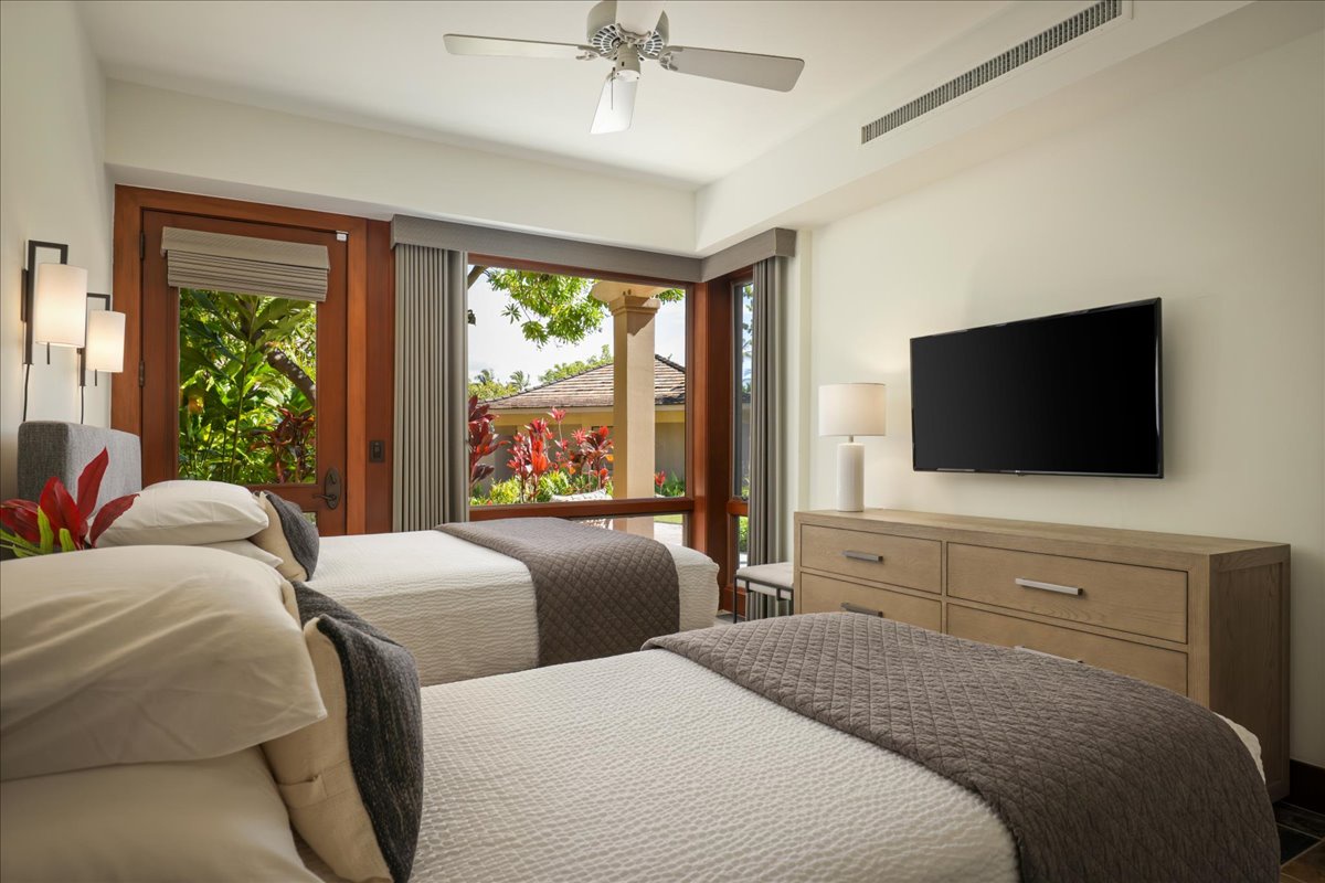 Kailua Kona Vacation Rentals, 2BD Fairways Villa (120C) at Four Seasons Resort at Hualalai - Alternate view of guest room with 2 beds, flatscreen television and patio.