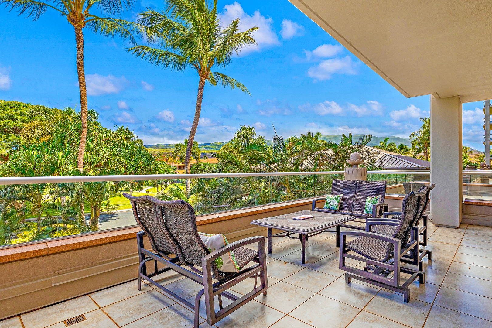 Lahaina Vacation Rentals, Honua Kai Konea 232 - Relax on the spacious lanai featuring comfortable seating and picturesque views of Hawaii.