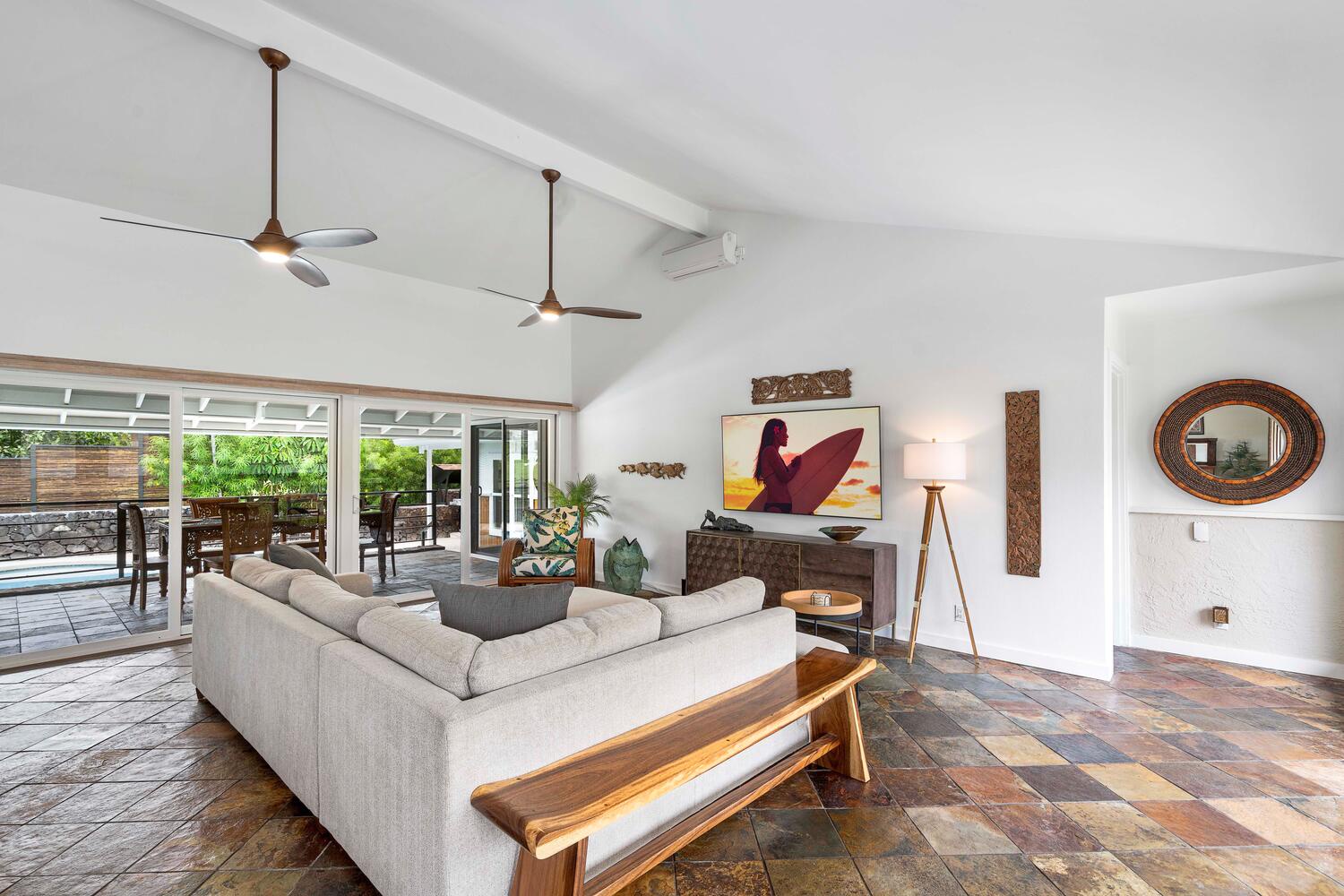 Kailua Kona Vacation Rentals, Manukai Hale - Lounge in the spacious living area with cozy sectional sofas and TV.