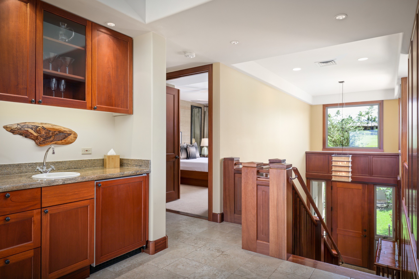 Kailua Kona Vacation Rentals, 3BD Ke Alaula (210B) Villa at Hualalai Resort - View of wet bar on upper landing looking toward guest room #3 and stairs toward front entrance.