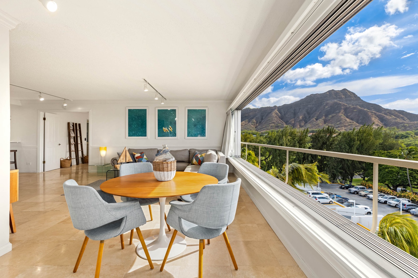 Honolulu Vacation Rentals, Colony Surf Getaway - Chic dining nook with stylish decor and expansive Diamon Head views, offering an inspiring backdrop for meals and conversations.