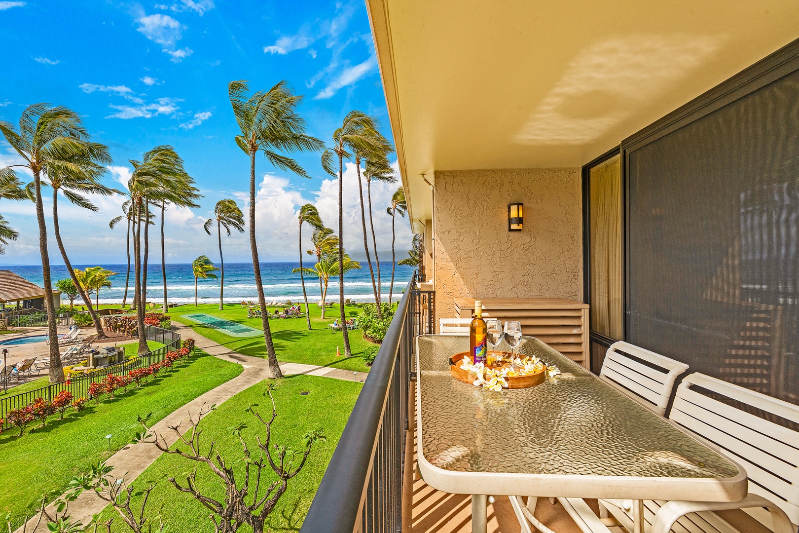 Lahaina Vacation Rentals, Papakea G-306 - The private lanai offers stunning ocean views, the perfect spot to enjoy a meal or relax with a drink while taking in the tropical surroundings.