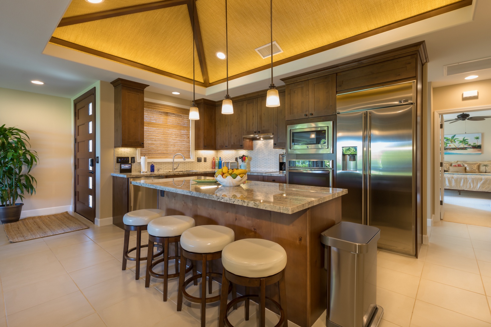 Kamuela Vacation Rentals, Mauna Lani KaMilo #407 - Gorgeous open kitchen with bar seating.