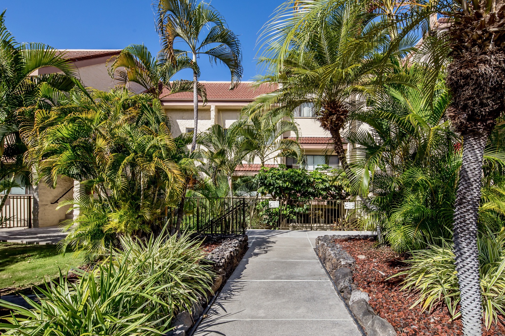 Kailua Kona Vacation Rentals, Keauhou Kai C301 - Walk the garden path back from the pool.