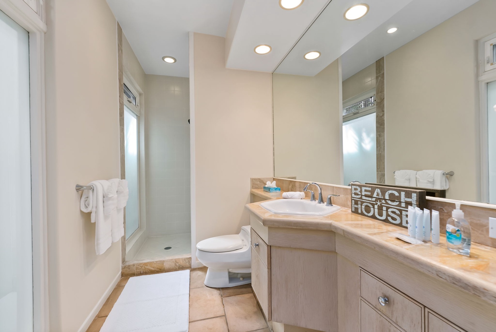 Honolulu Vacation Rentals, Diamond Head Luxe - Your private sanctuary features a spacious walk-in shower, elegant vanity, and thoughtful coastal touches that make daily routines feel luxurious.