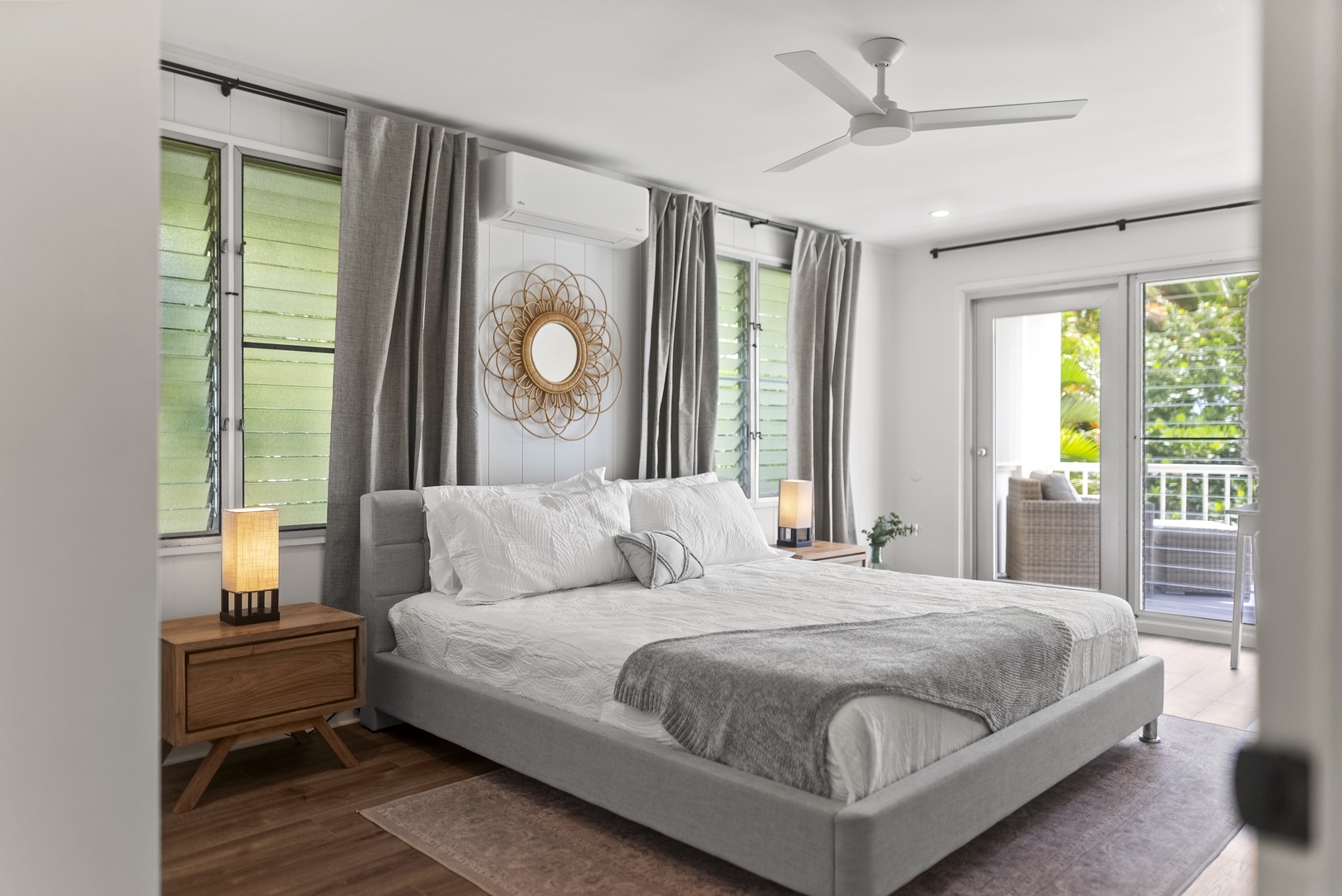 Honolulu Vacation Rentals, Honolulu Beachfront Retreat - Elegant primary suite with a king-sized bed, modern beach-chic décor, and soothing natural light throughout.