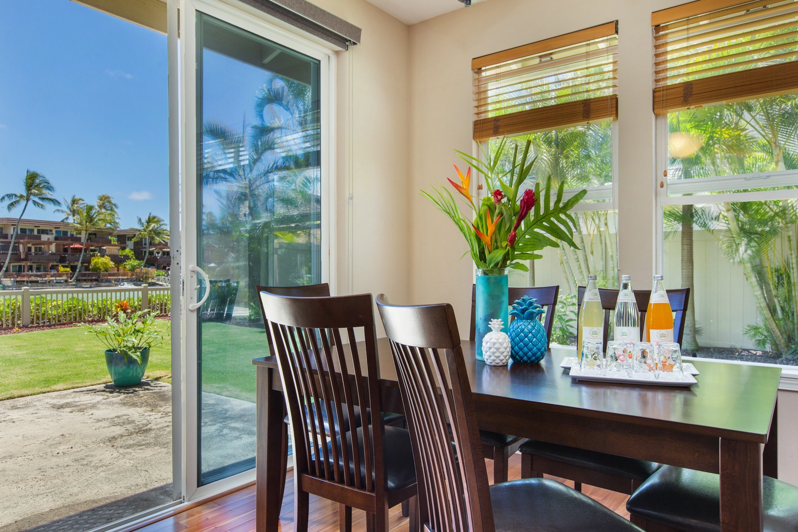 Honolulu Vacation Rentals, Ohana Kai - Gaze across the expansive dining area, seamlessly connecting to the kitchen and inviting living space.