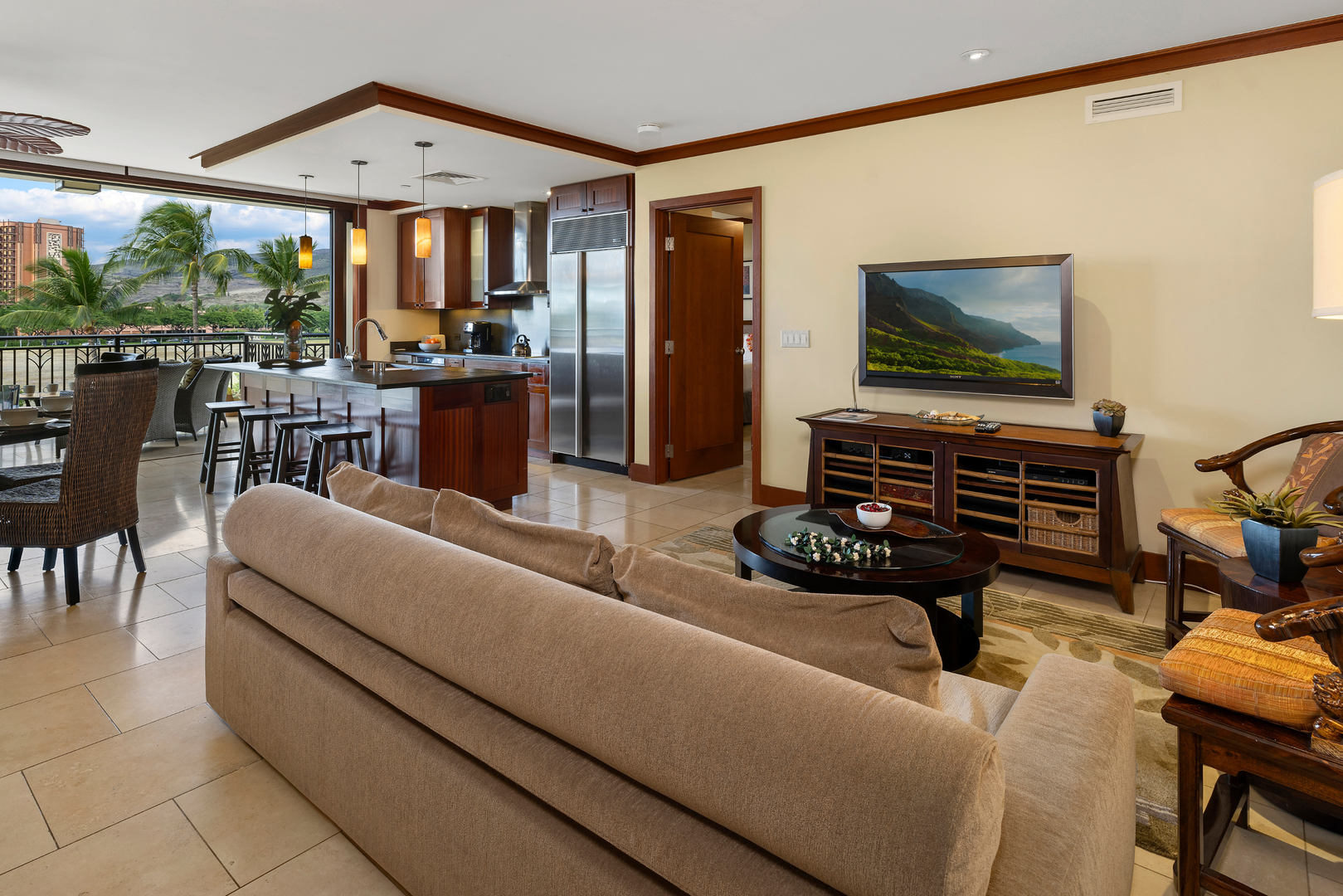 Kapolei Vacation Rentals, Ko Olina Beach Villas O414 - Seamless living in the beautifully furnished living room that overlooks the kitchen and dining room