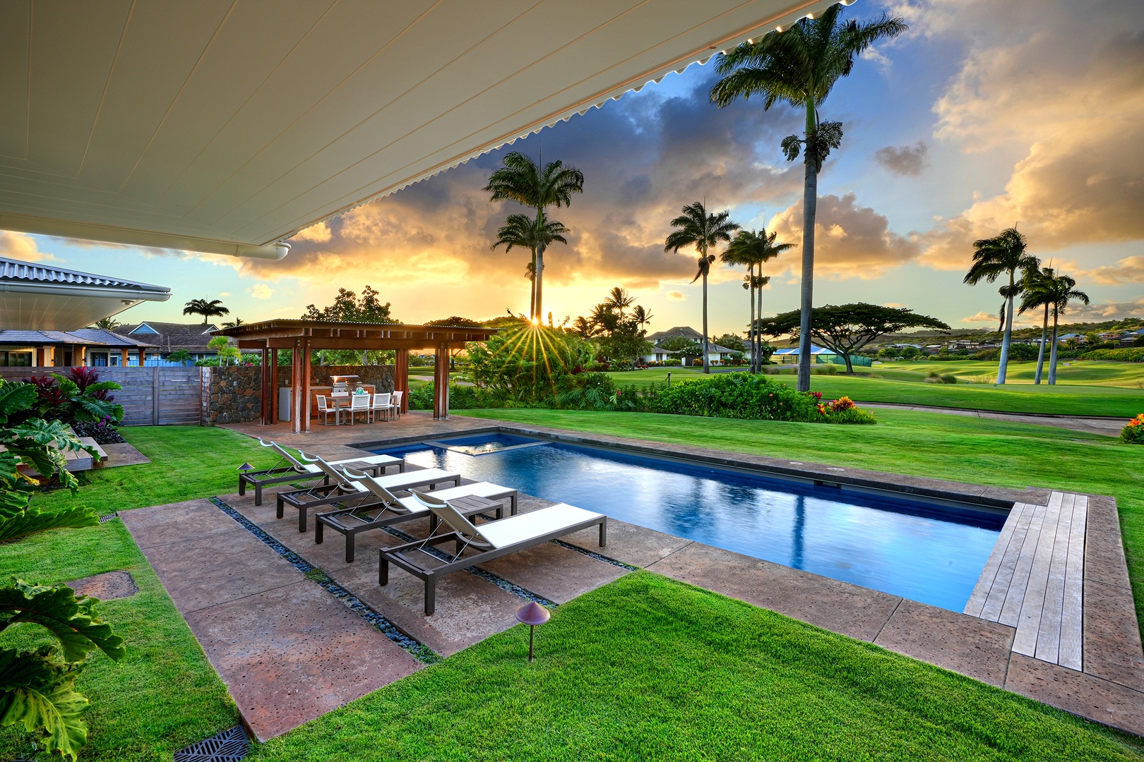 Koloa Vacation Rentals, Kaulu Hale at Kukuiula - Relax poolside and take in the peaceful sunset views.