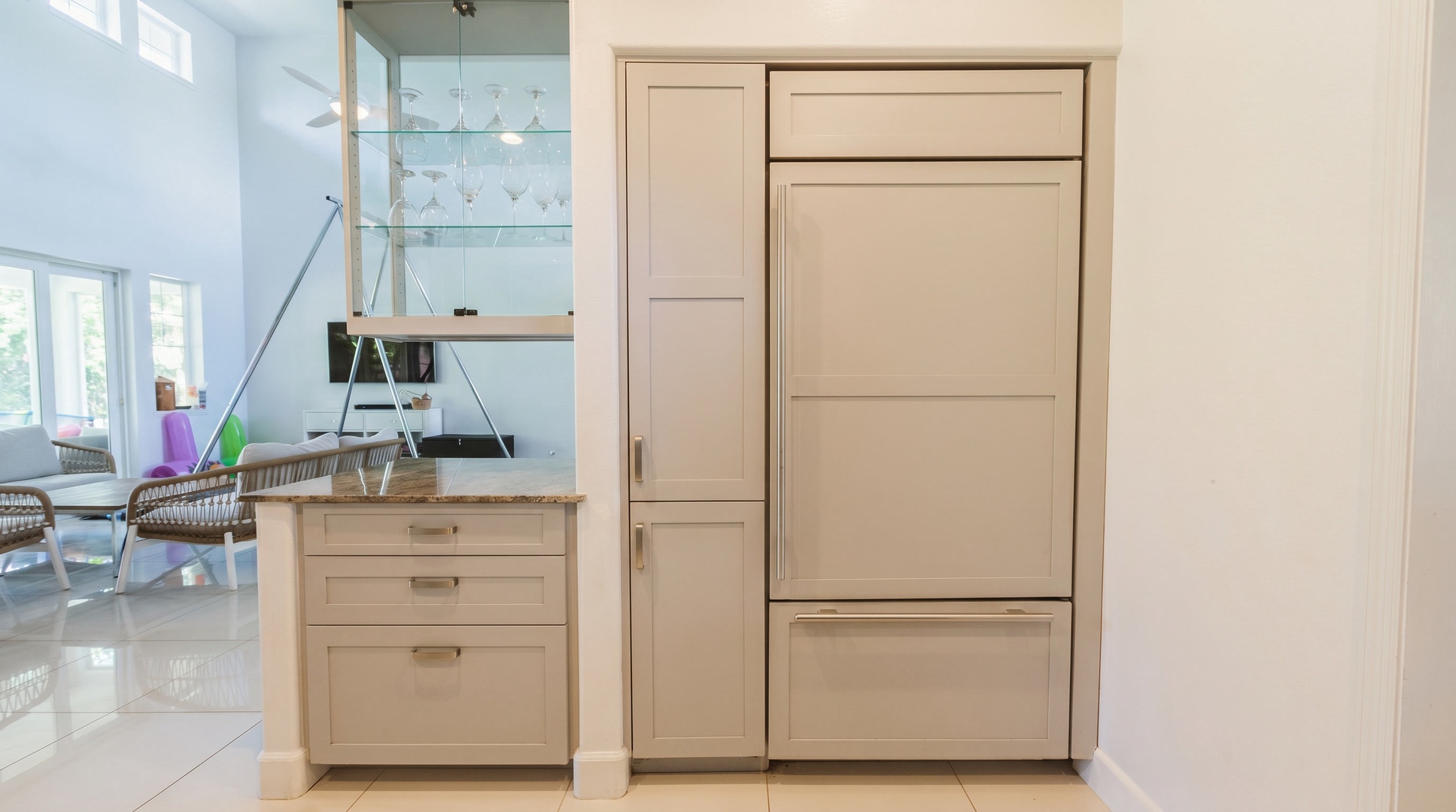 Room for a week of groceries in a full-height refrigerator paneled to match the cabinets.