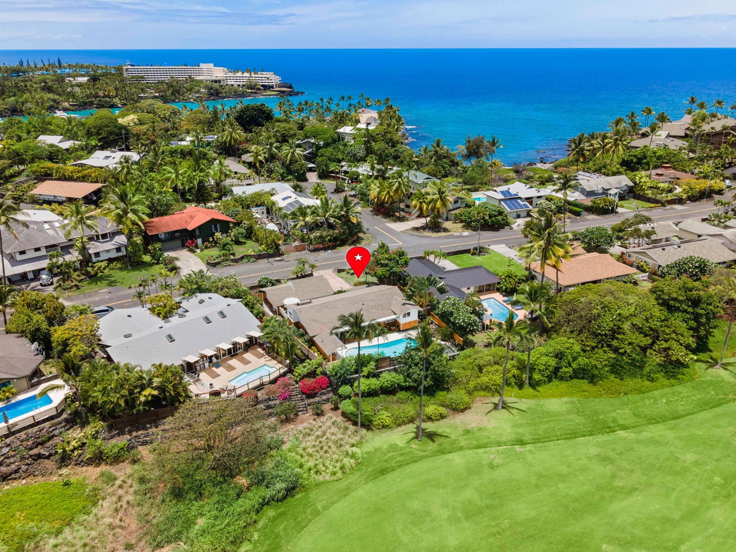 Kailua Kona Vacation Rentals, Manukai Hale - From above, the property sits framed in green with the coastline on the horizon.