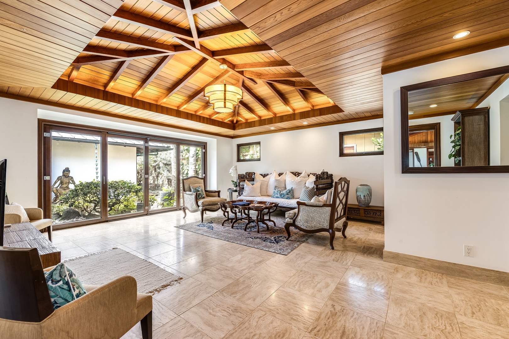Kailua Vacation Rentals, Castle Point Estate - Tranquil sitting area with vaulted ceilings, natural light, and direct access to garden views.