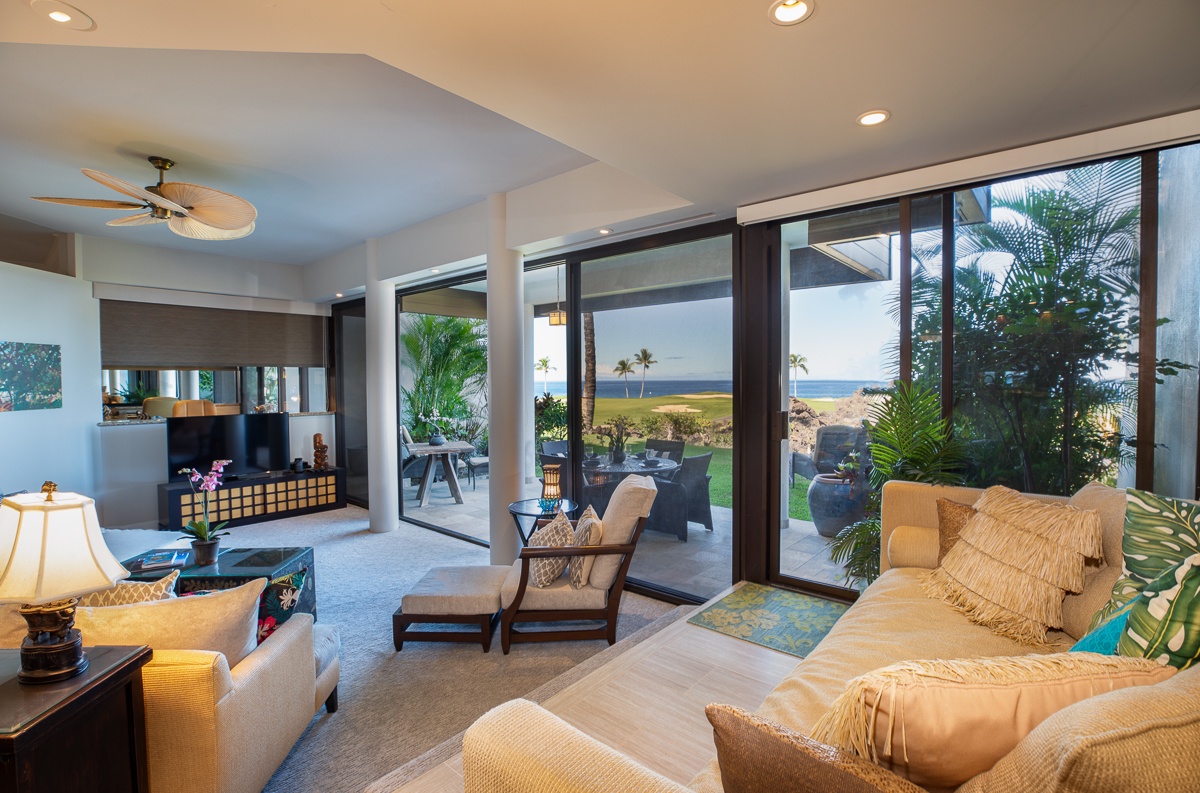 Kamuela Vacation Rentals, Mauna Lani Point B105 - Directly overlooking the illustrious 15th hole of the Mauna Lani Golf Course, one of the most photographed over-the-ocean holes in the world