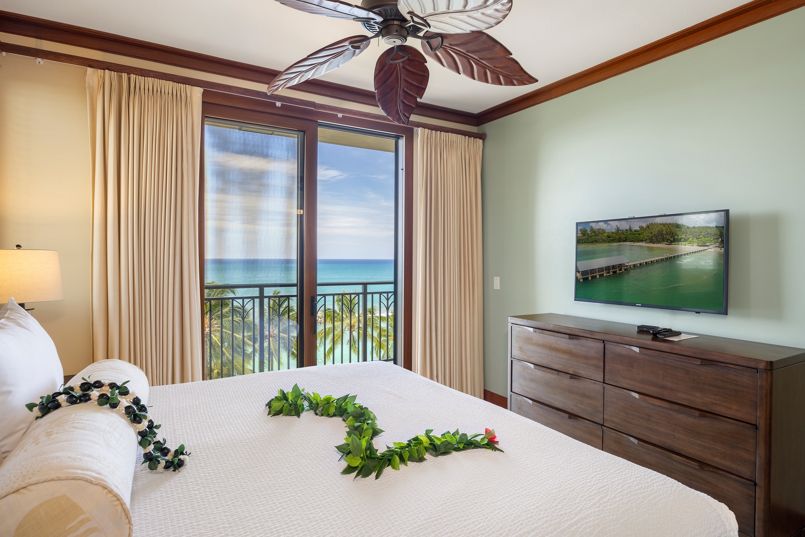 Kapolei Vacation Rentals, Ko Olina Beach Villas B609 - Wake up to stunning ocean views from your private lanai. The tropical ceiling fan and fresh island lei create perfect paradise vibes.