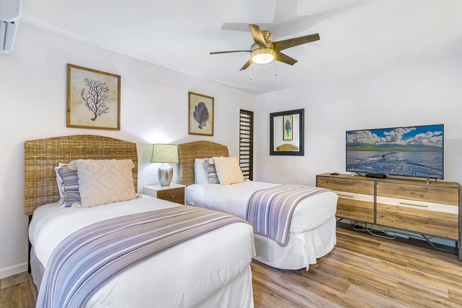 Kihei Vacation Rentals, Wailea Ekolu 1605 - The guest bedroom features two twin beds and a flat-screen TV, perfect for a relaxing stay.